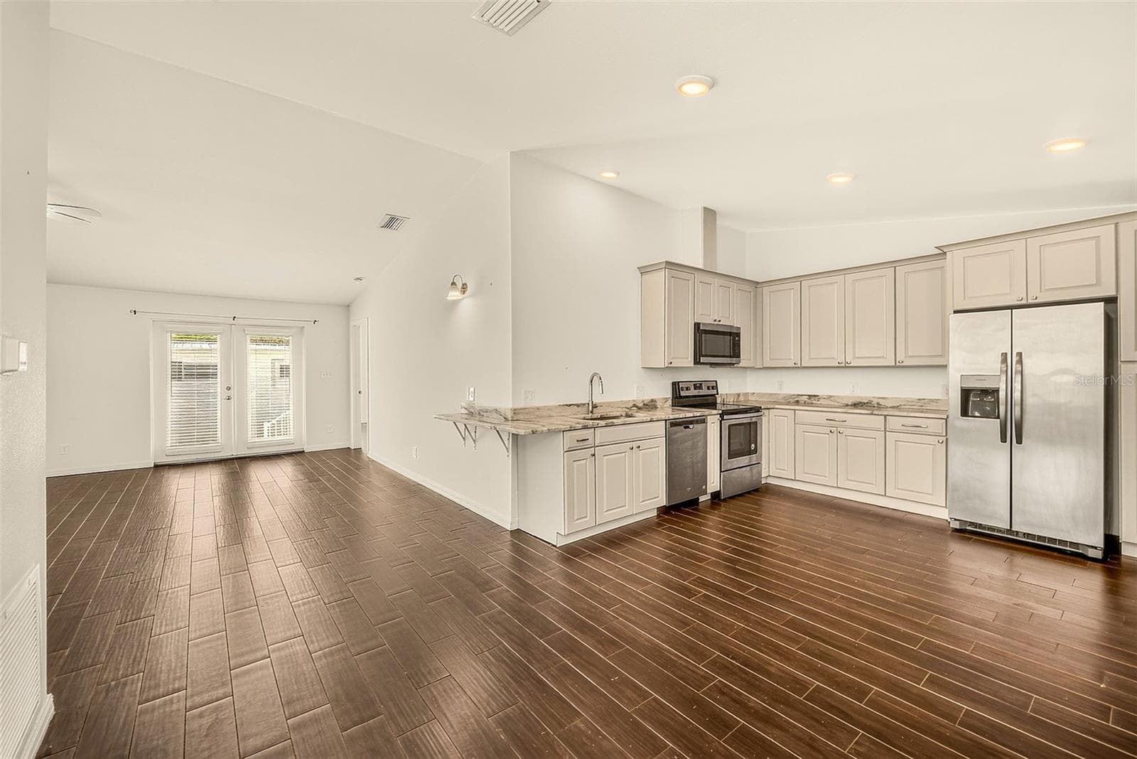 Single Family Residence at 14334 CHANNEL DR, LARGO, photo 7 of 59