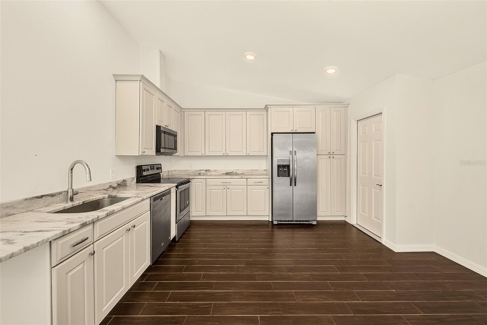 Single Family Residence at 14334 CHANNEL DR, LARGO, photo 10 of 59