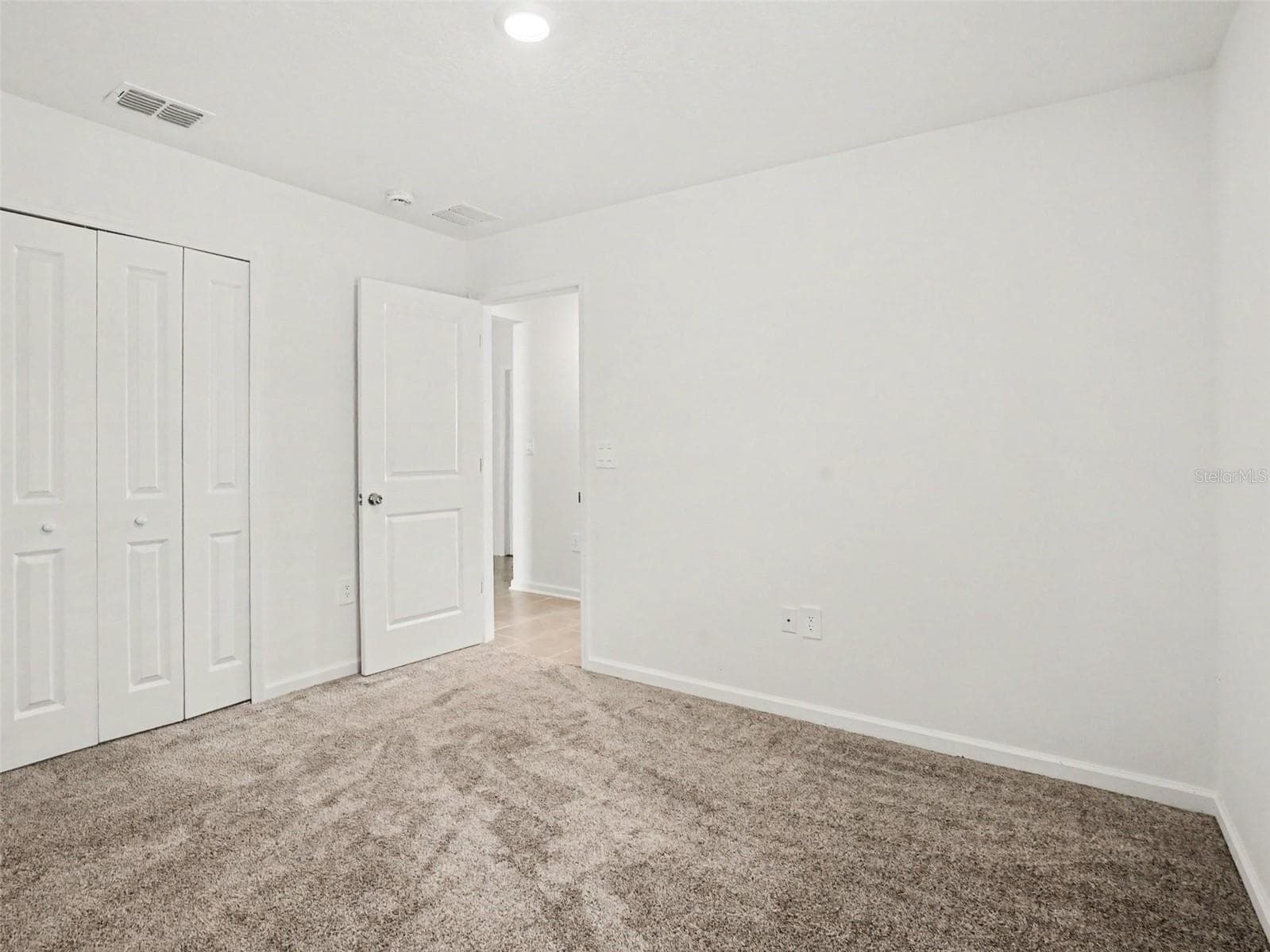 Single Family Residence at 3085 BLUE BONNET LN, OSTEEN, photo 9 of 14