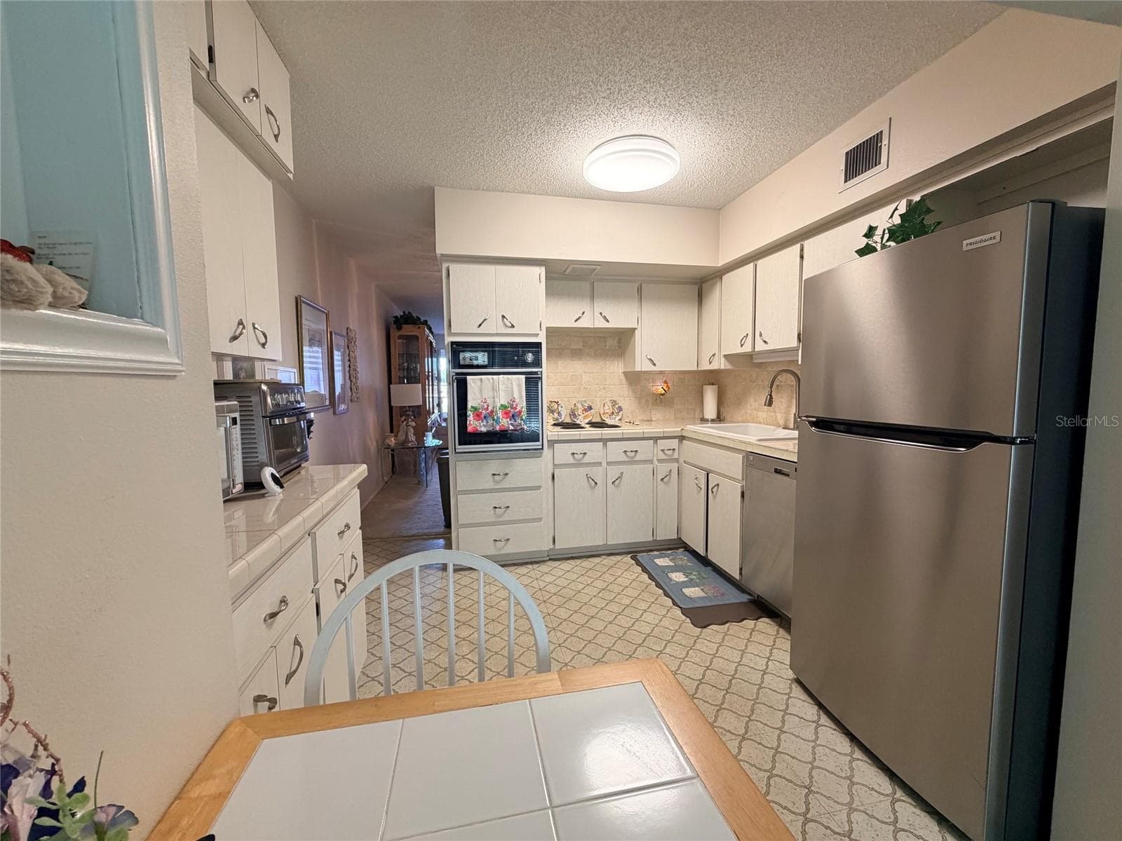 Storage on Both sides of the kitchen - 2363 ISRAELI DR #33, CLEARWATER