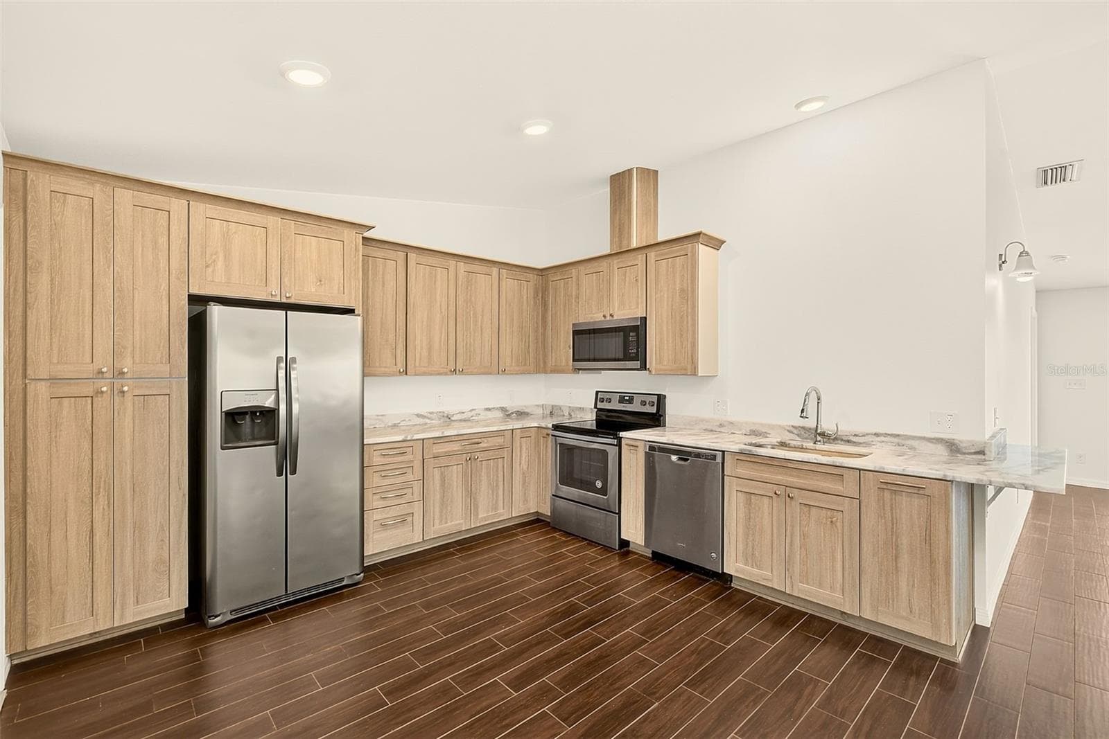 Large Kitchen has SS appliances - 14330 CHANNEL DR, LARGO
