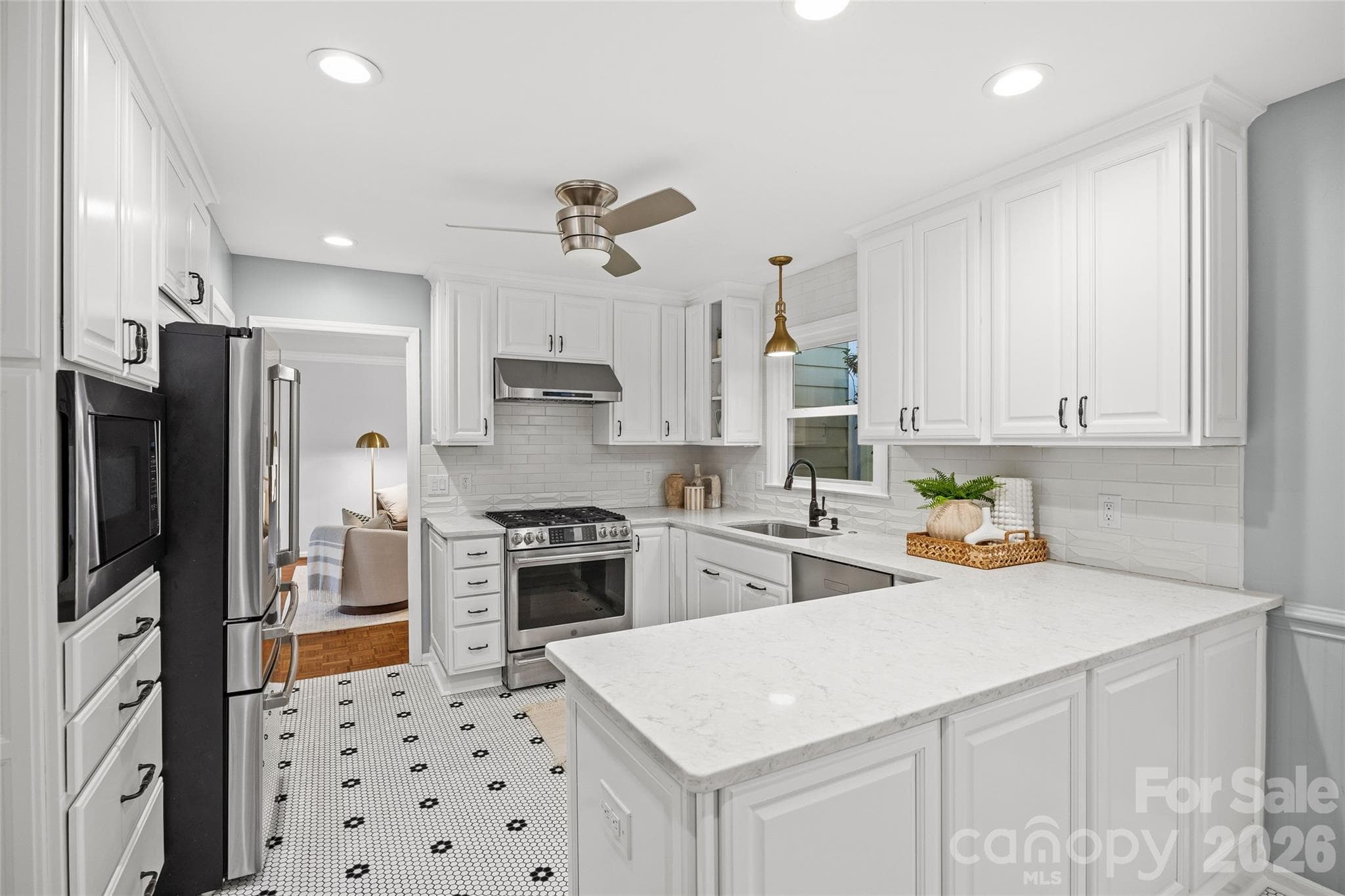 Freshly Painted Cabinets and Modern Upgrades in Kitchen - 5132 Camilla Drive, Charlotte