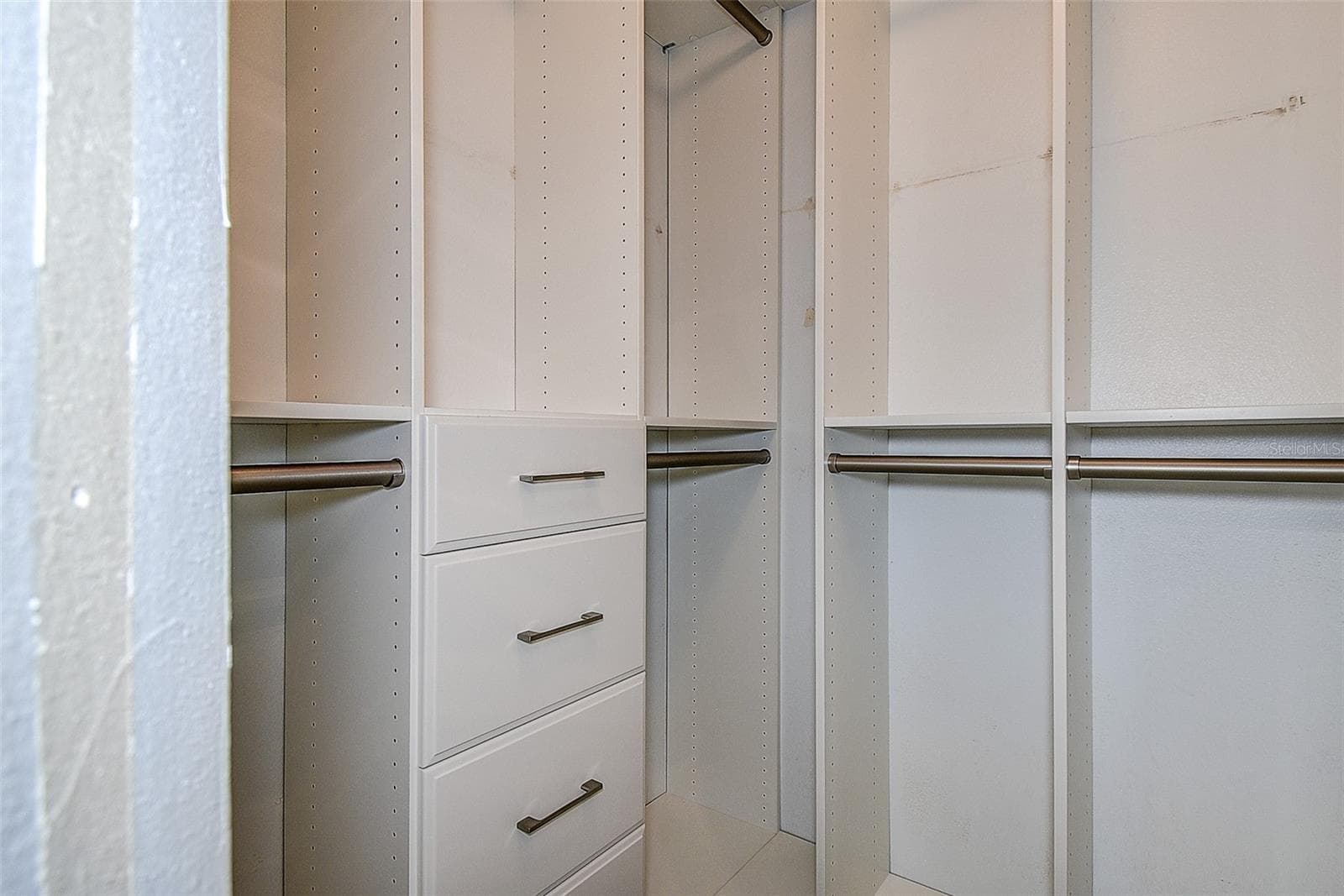Walk-in closet with organizer - 8265 GOODRICH ST, SPRING HILL