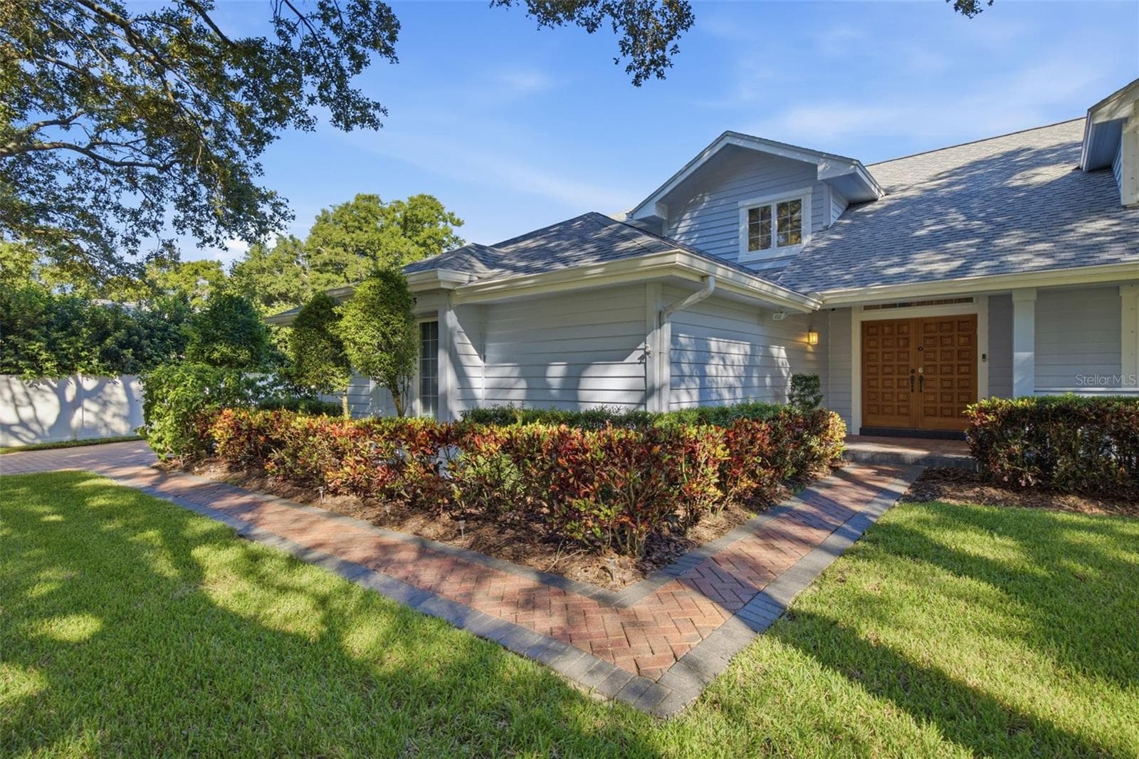 Concrete Paver entry from driveway to front door. - 12383 WINDTREE BLVD, SEMINOLE