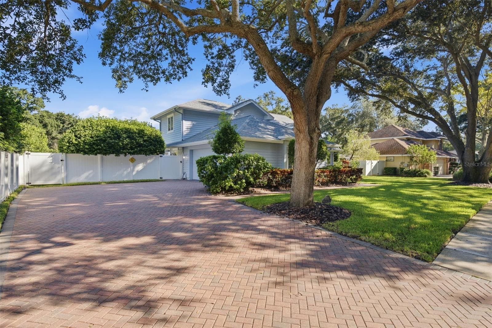 Concrete Paver Driveway, Mature Landscaping, Side Entry Garage - 12383 WINDTREE BLVD, SEMINOLE
