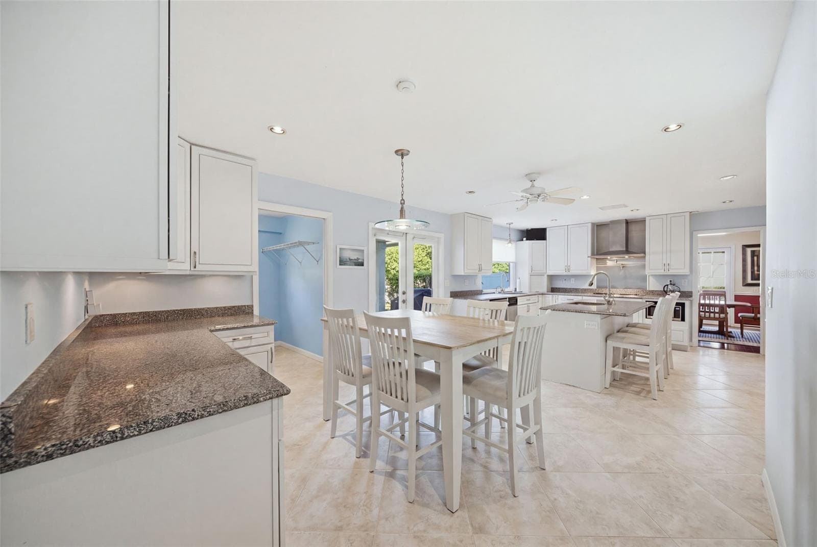 Kitchen offers plenty of built-ins and storage - 12383 WINDTREE BLVD, SEMINOLE