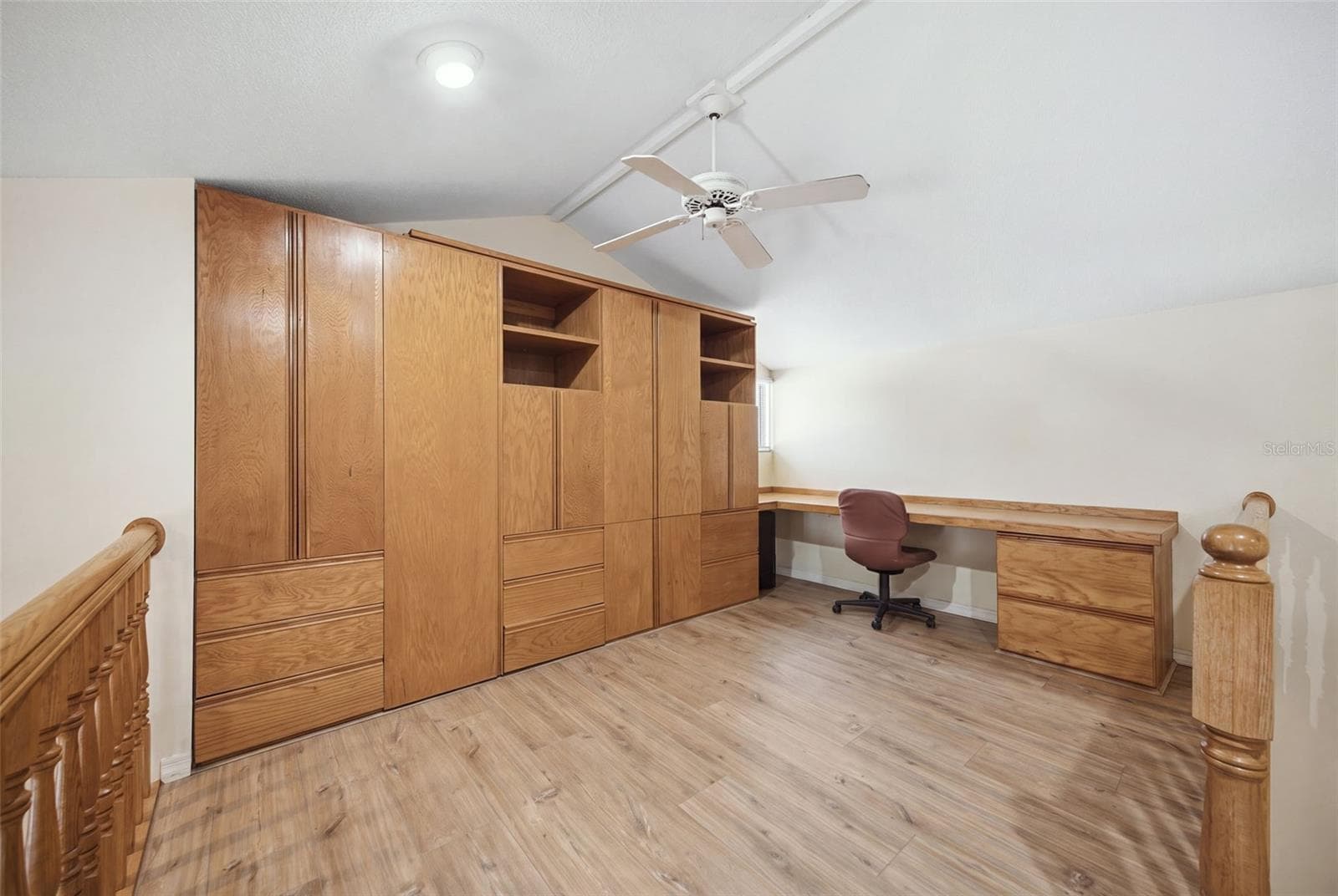 Second Floor Loft with built-in storage and desk. - 12383 WINDTREE BLVD, SEMINOLE