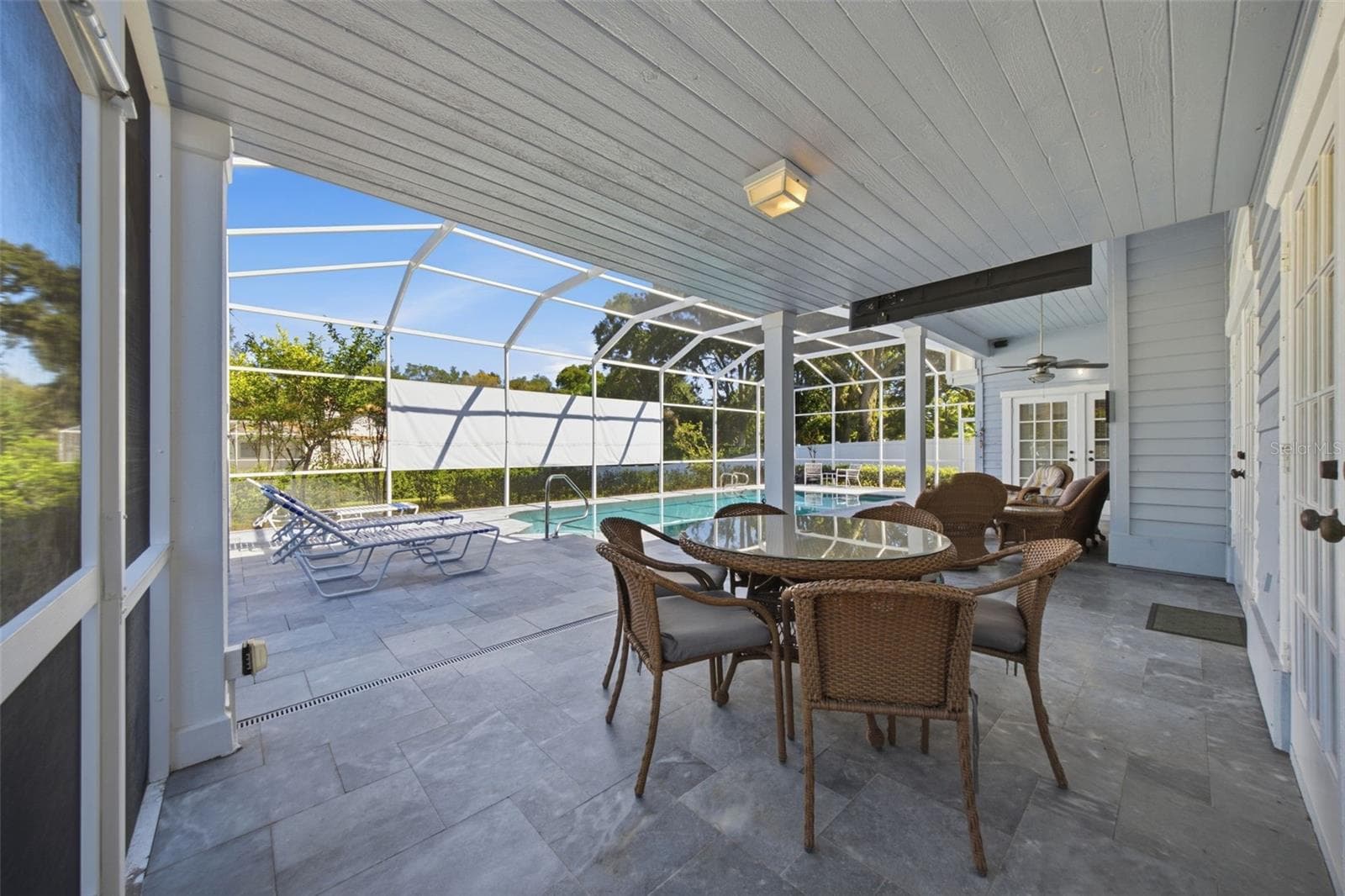 Covered Dining Area on the Lanai - Screen Enclosure - 12383 WINDTREE BLVD, SEMINOLE