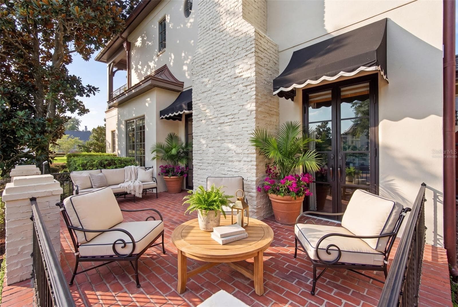 side patio virtually staged - 2228 AZALEA PL, WINTER PARK