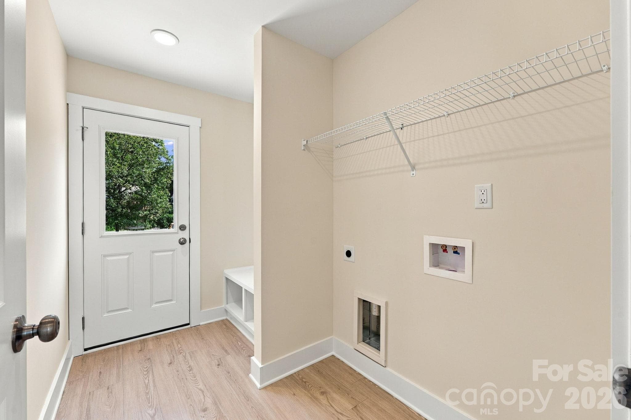 Laundry Room with exit to back patio. - 808 4th Street, Albemarle