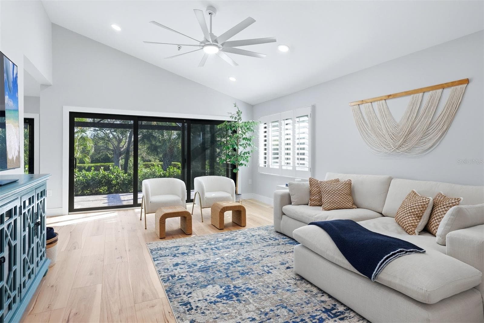 Living Room with access to screened lanai with new pavers - 2141 HARBOURSIDE DR #1203, LONGBOAT KEY