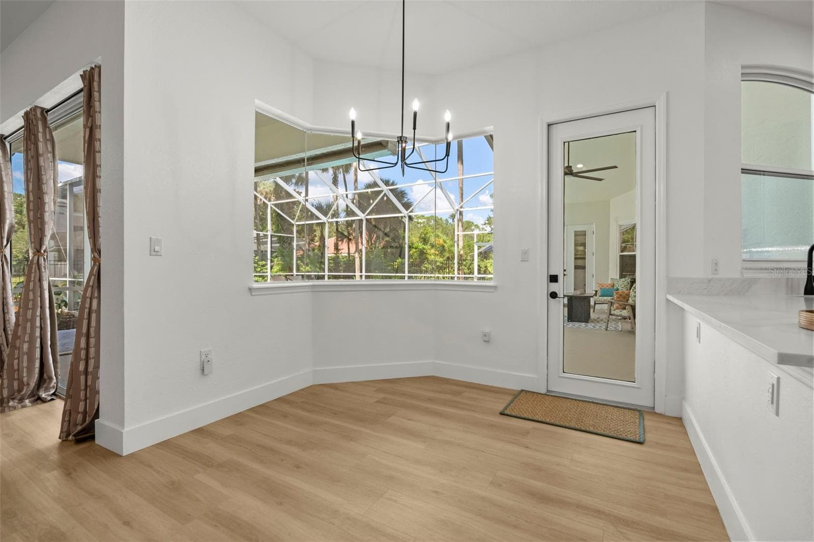 Eat-in area for kitchen overlooking pool - 5331 LAKE BLUFF TER, SANFORD