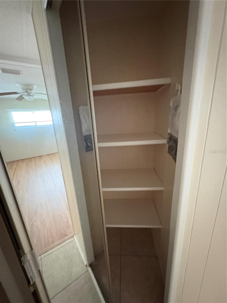 Linen Closet Ensuite bath - 7507 DINSMORE ST, BROOKSVILLE