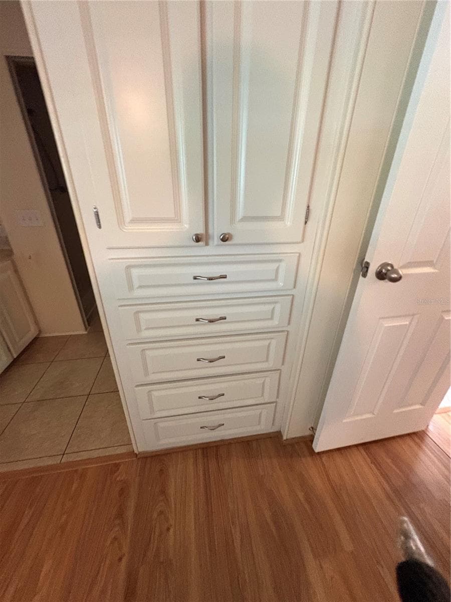 Built in shelving/drawers Primary Bedroom - 7507 DINSMORE ST, BROOKSVILLE