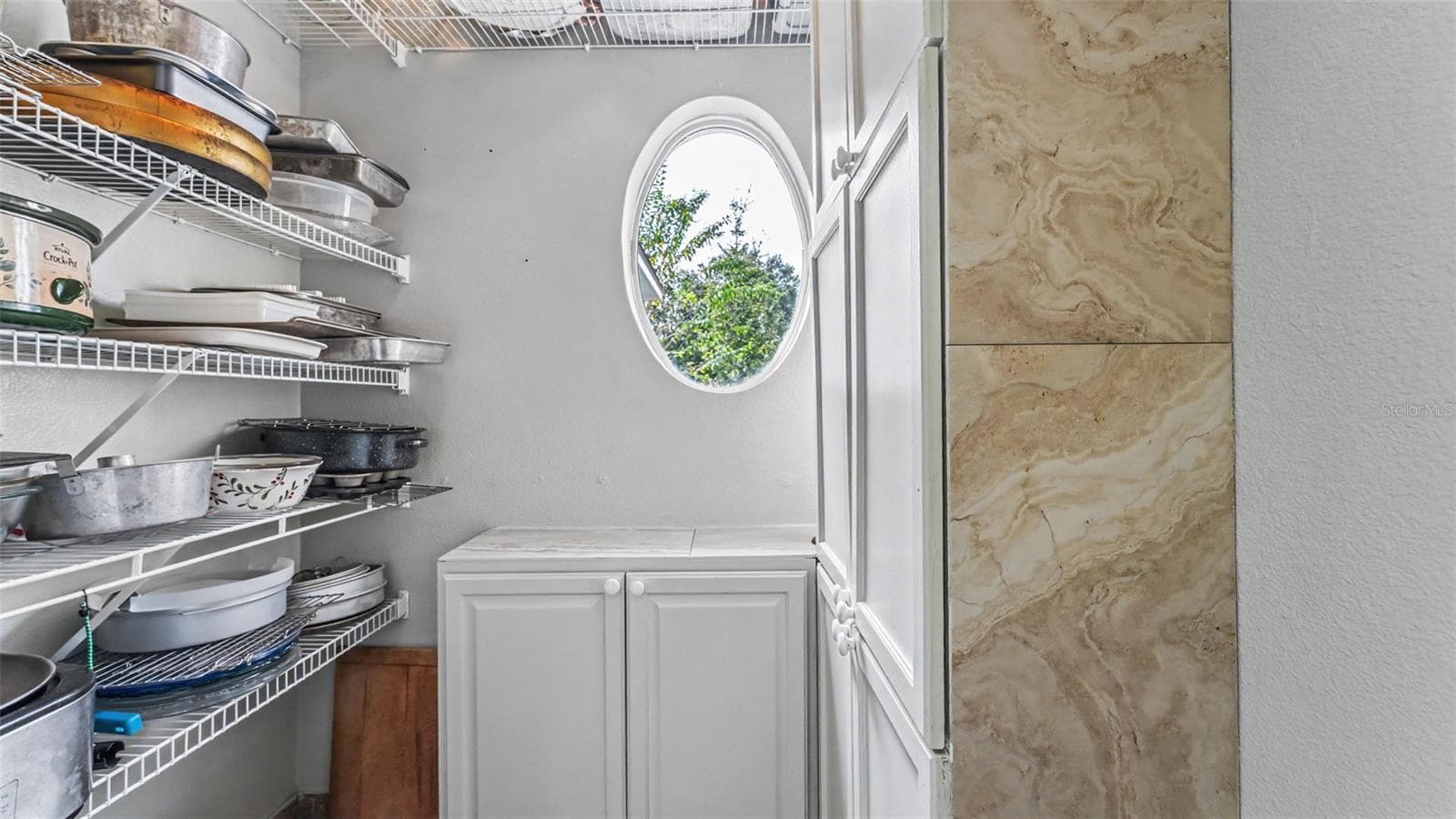 walk-in pantry storage room - 6626 ROYAL FOREST DR, LAKELAND