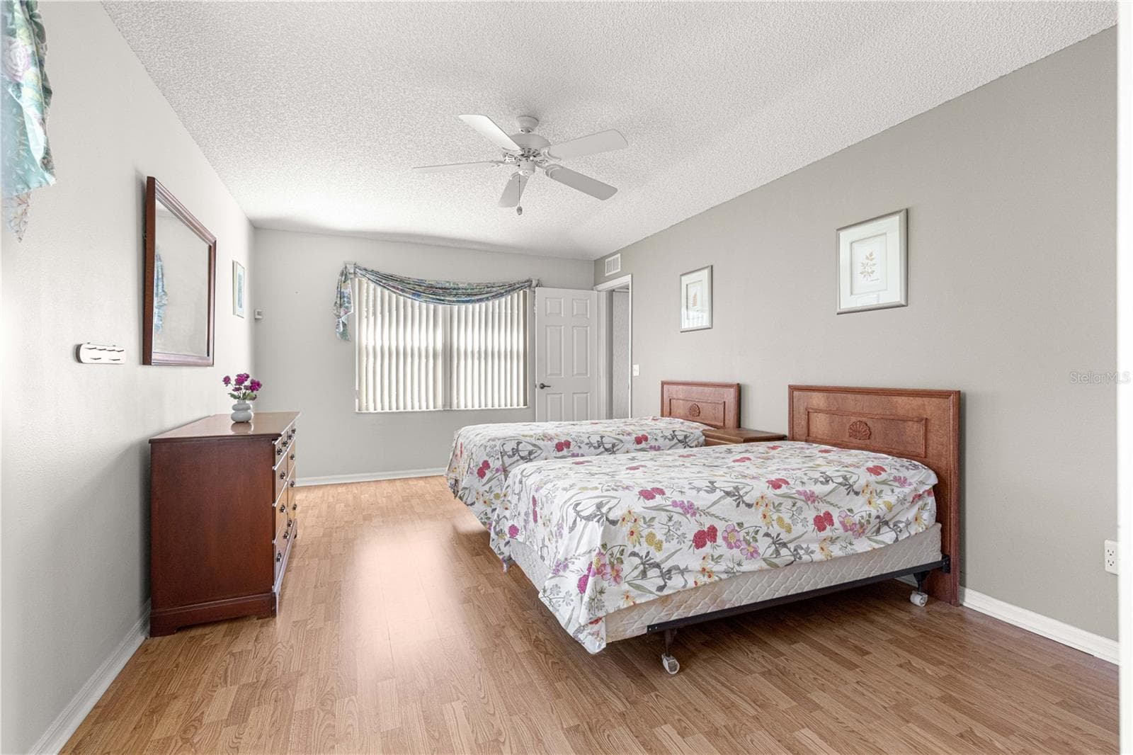 Walk in Closet includes plenty of organization and shelving. - 6164 SW 84 LN, OCALA