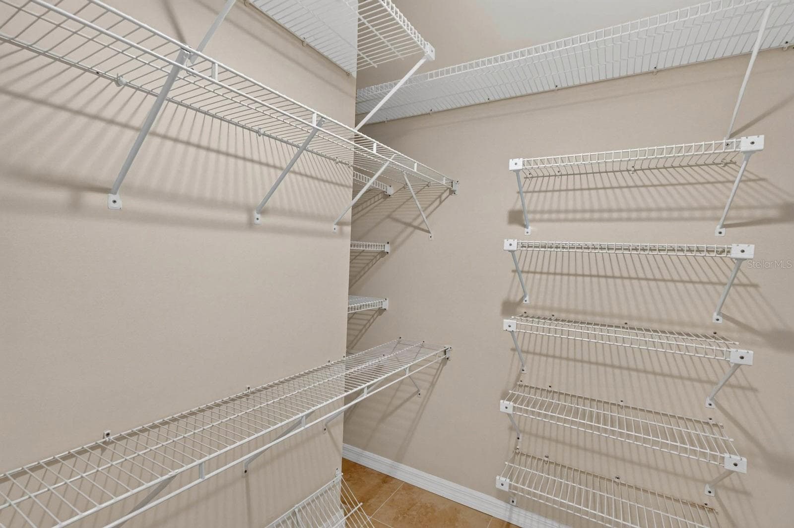 Walk-In Closet With Ample Shelving - 74 COVINGTON LN, PALM COAST
