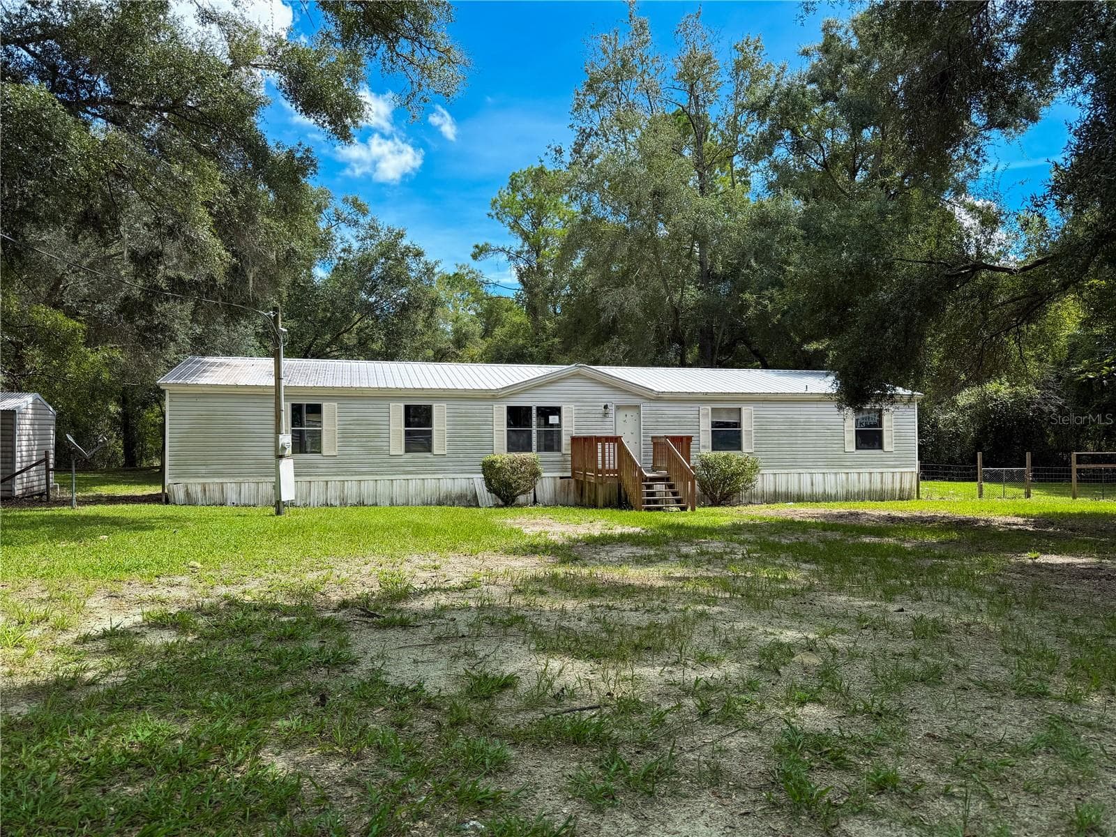 Manufactured Home at 19413 SW STATE ROAD 47, FORT WHITE, photo 2 of 25