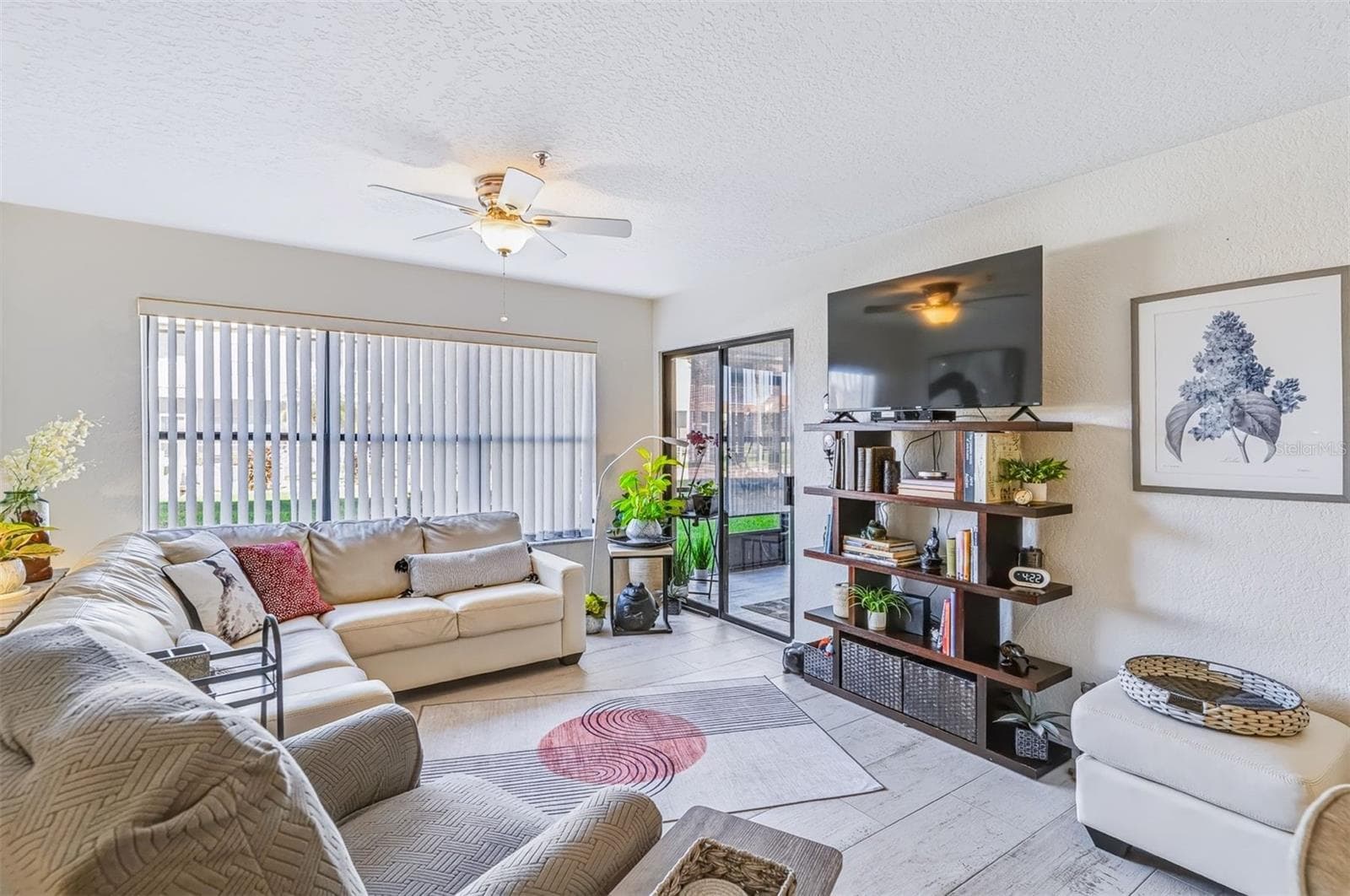 Living area with lots of natural light - 406 BOUCHELLE DR #103, NEW SMYRNA BEACH