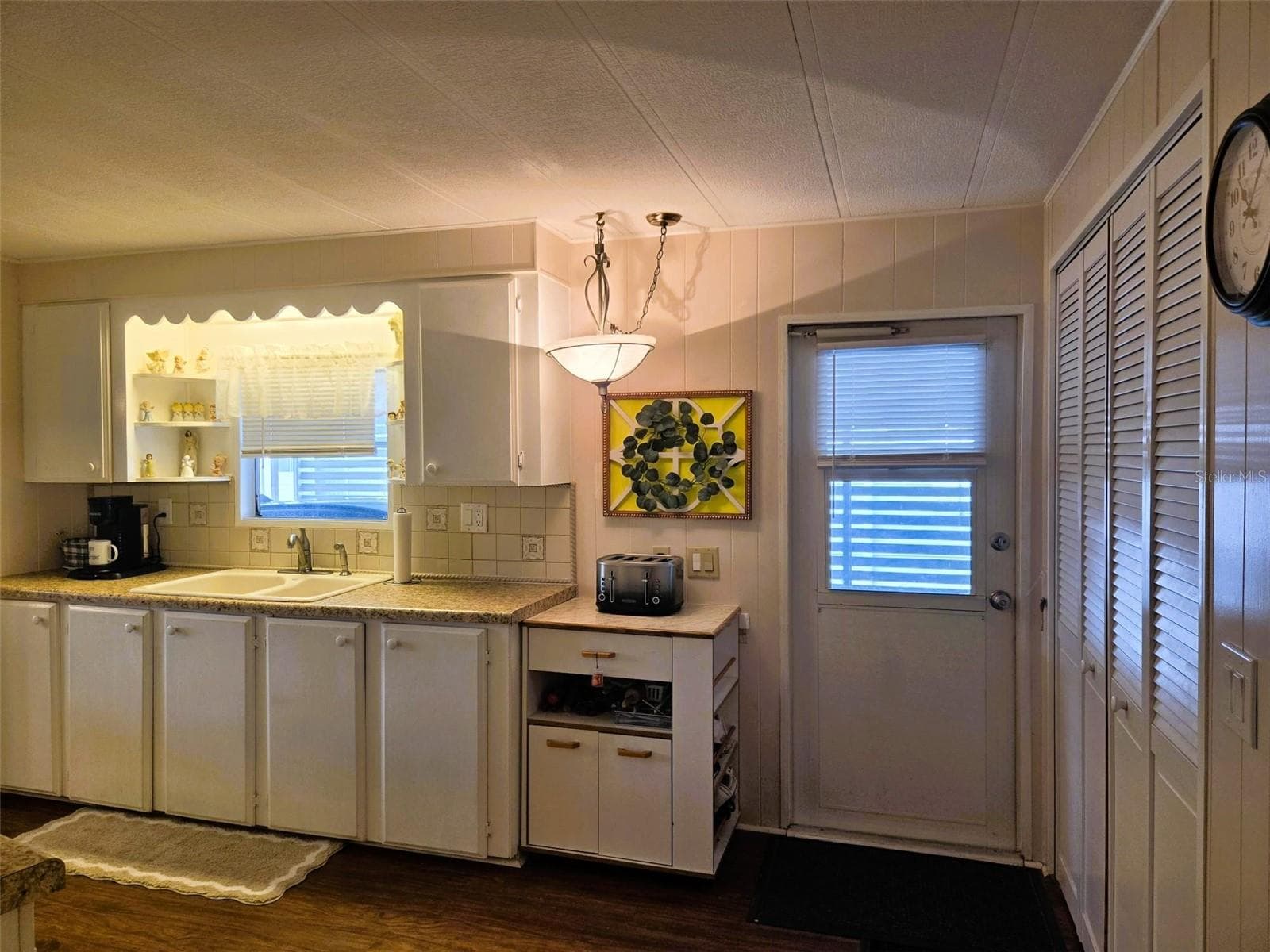 Door out the kitchen area to carport - 3309 OAKWOOD BLVD S, SARASOTA