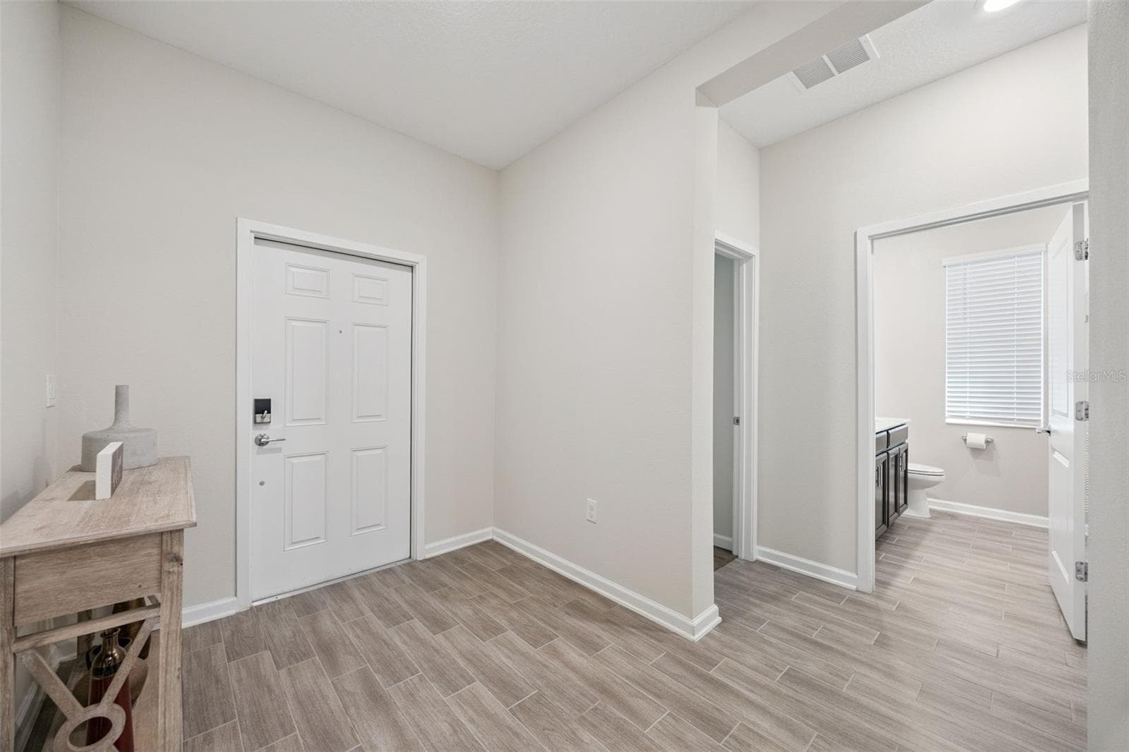 Foyer View-2 Bedrooms & Guest Bathroom - 5309 AMERSHAM LN, ST CLOUD