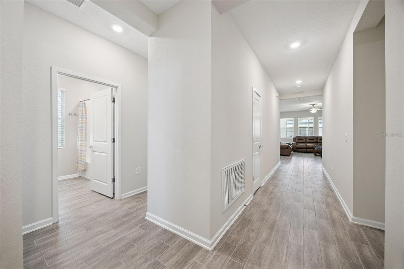 Foyer View-Guest Bath & Main Living Area - 5309 AMERSHAM LN, ST CLOUD