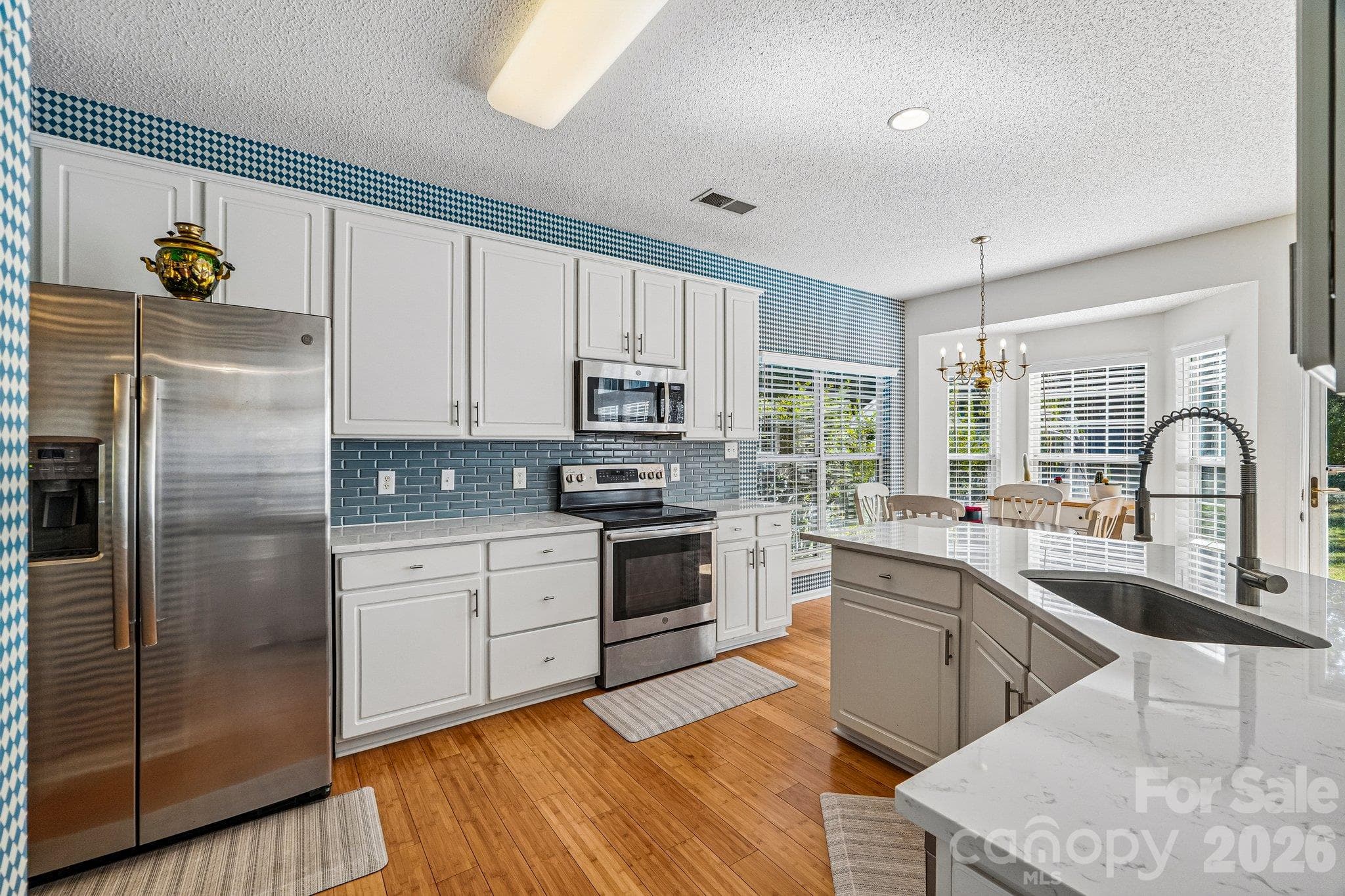 Beautifully updated and sun-soaked kitchen - 11207 Livingston Mill Road, Charlotte