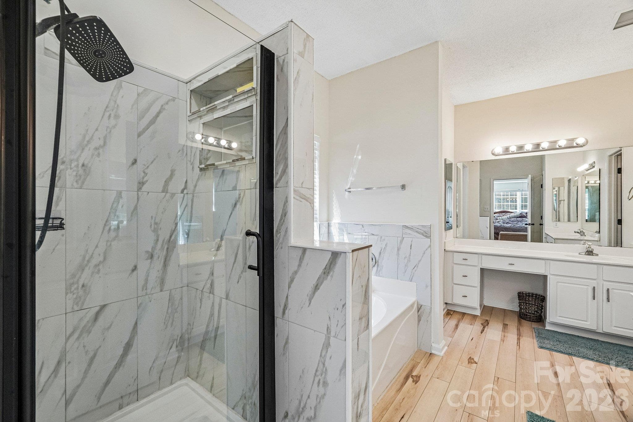 Bathroom offers soaker tub and walk-in shower - 11207 Livingston Mill Road, Charlotte