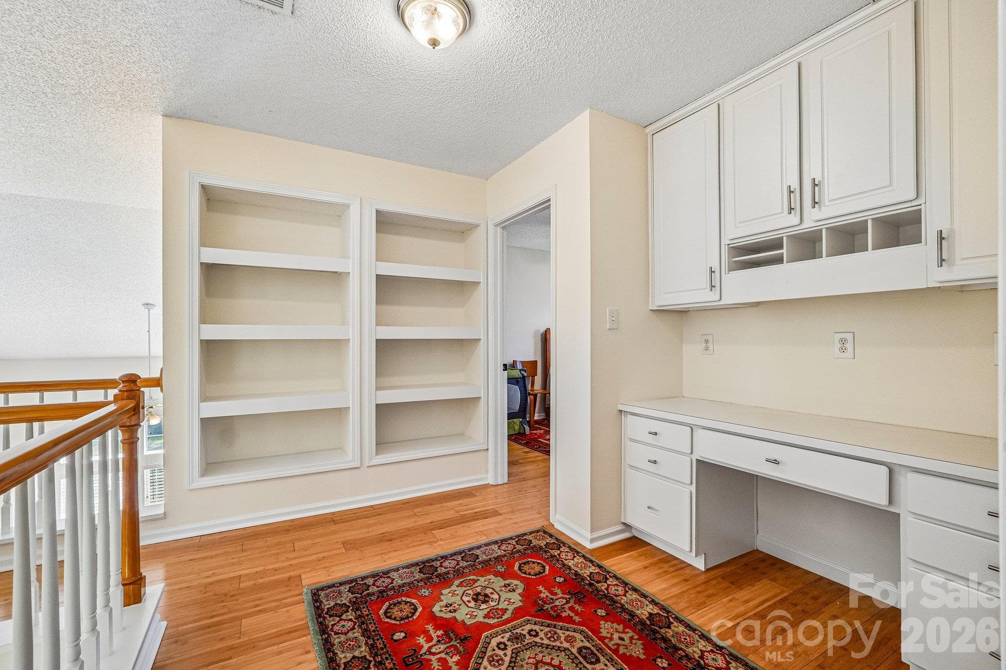 Loft area on upper level offer built-ins and study area. - 11207 Livingston Mill Road, Charlotte