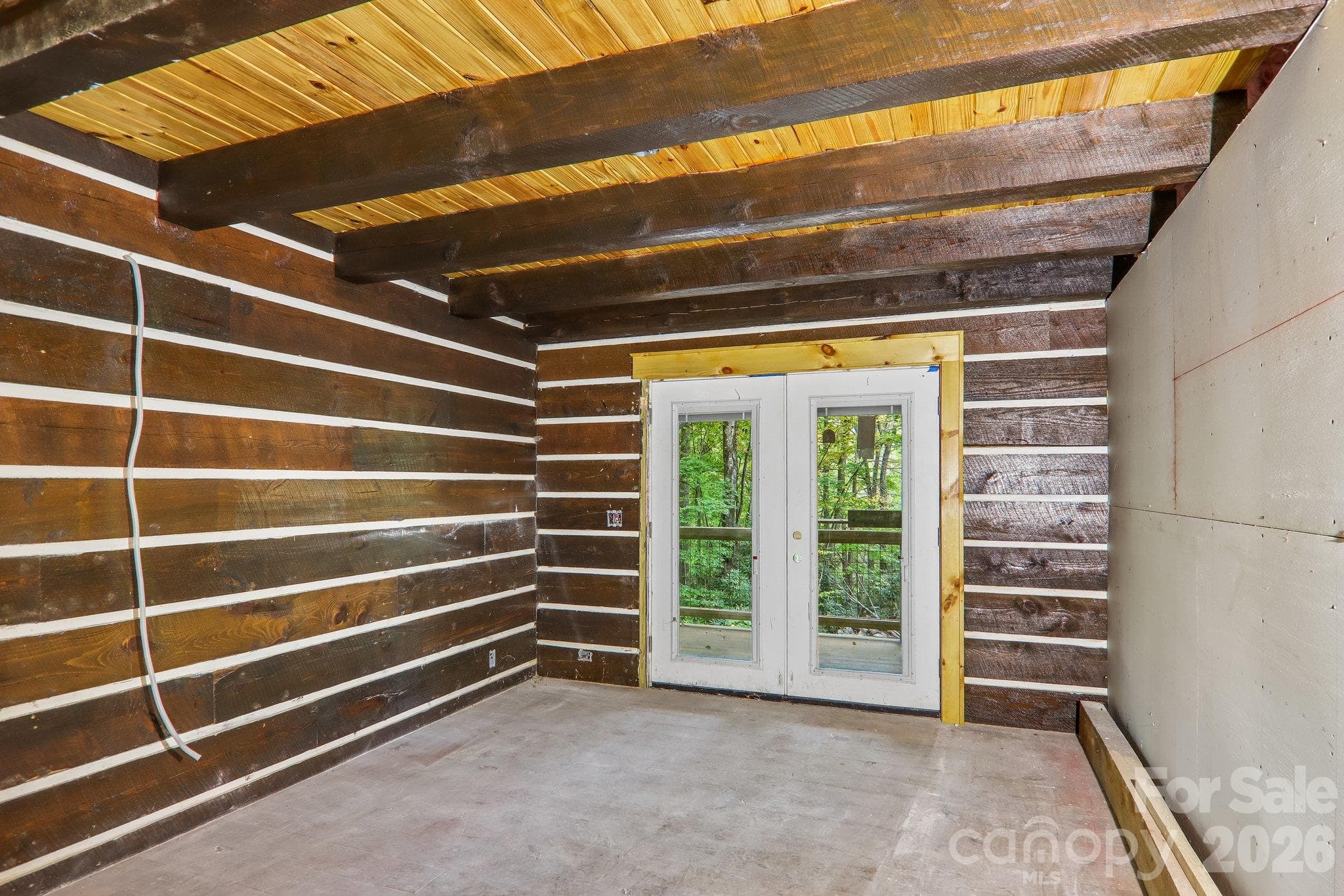 Primary bedroom opens to porch - 5 Marion Drive, Maggie Valley