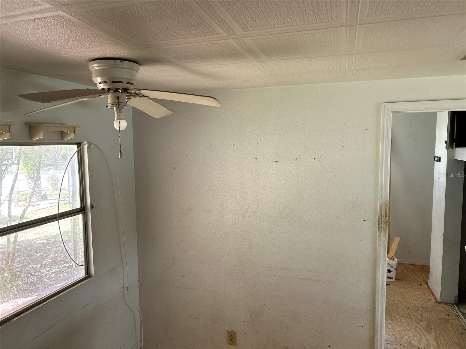 dining area in kitchen looking into bedroom 2 and living area. - 14506 DEHAVEN AVE, BROOKSVILLE