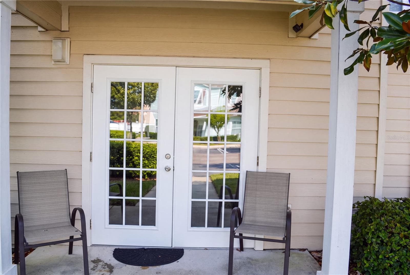 Rear Covered Porch with French Doors - WEST LUCAYA VILLAGE, KISSIMMEE