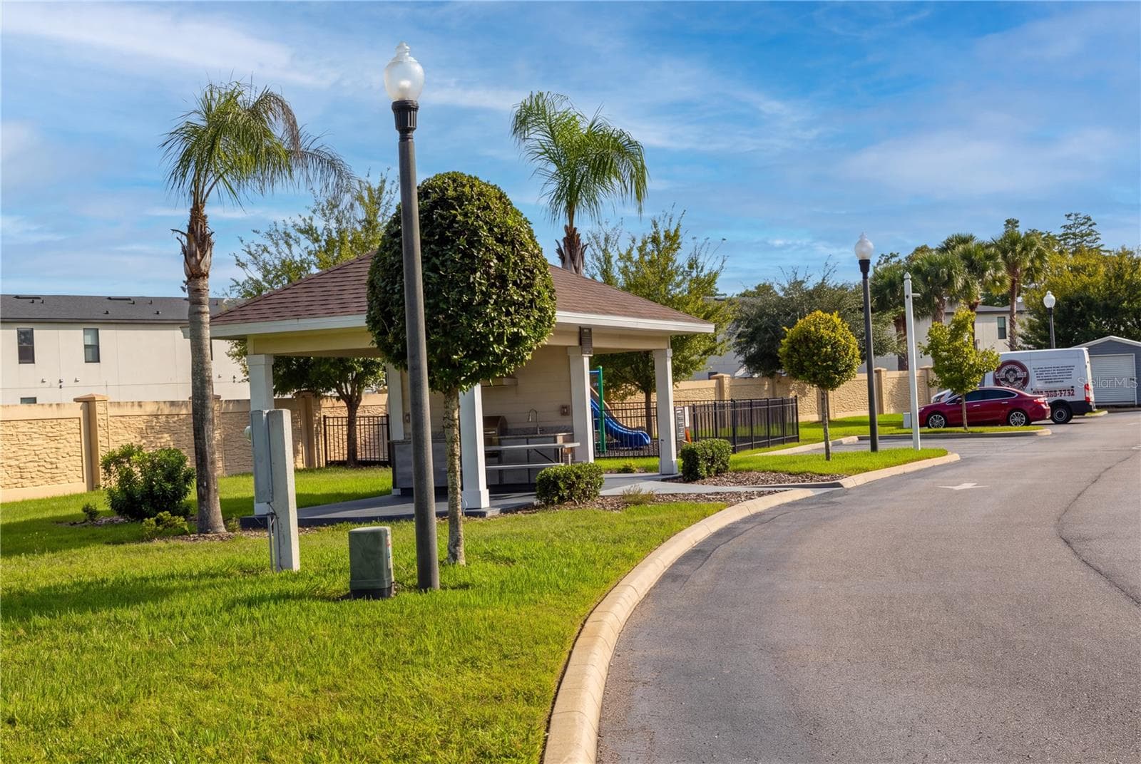 BBQ Area - directly across from the home - WEST LUCAYA VILLAGE, KISSIMMEE