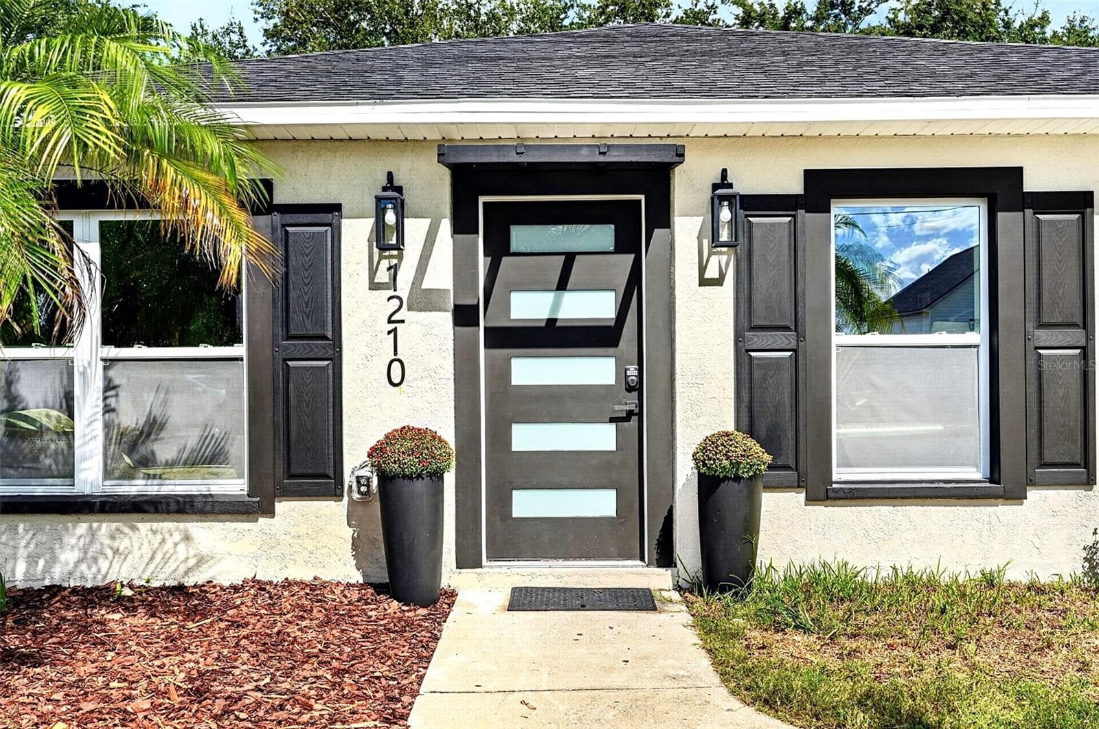 Modern front door - horizontal glass panels - 1210 CASA BONITA AVE, RUSKIN
