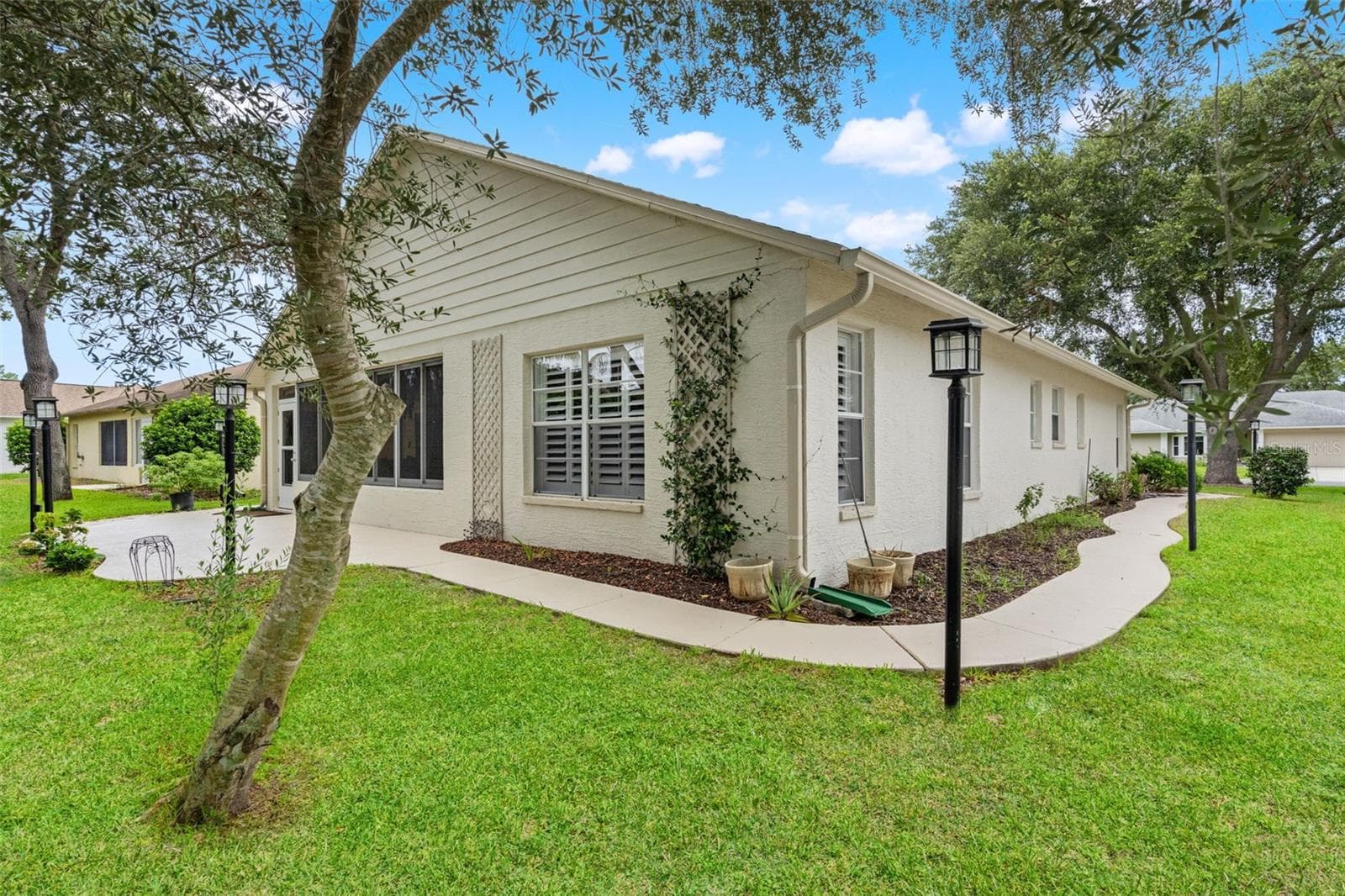 Concrete pathways all around the house - 7350 ROSEMONT LN, SPRING HILL