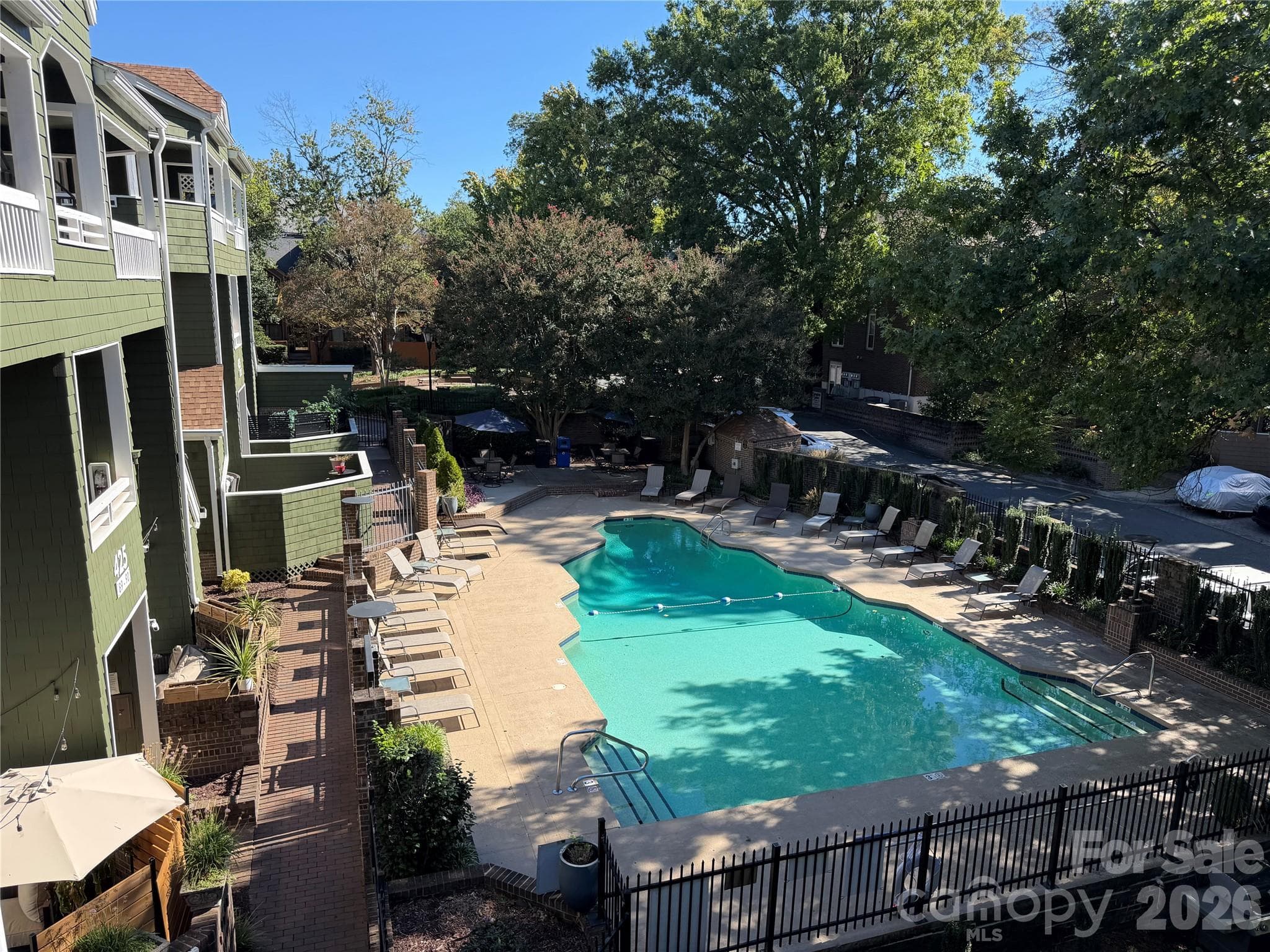 View of community pool from patio - 423 W 8th Street, Charlotte