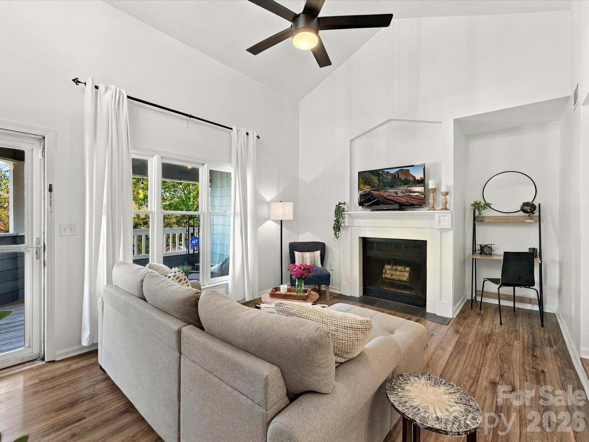 Living room with office nook and fireplace - 423 W 8th Street, Charlotte
