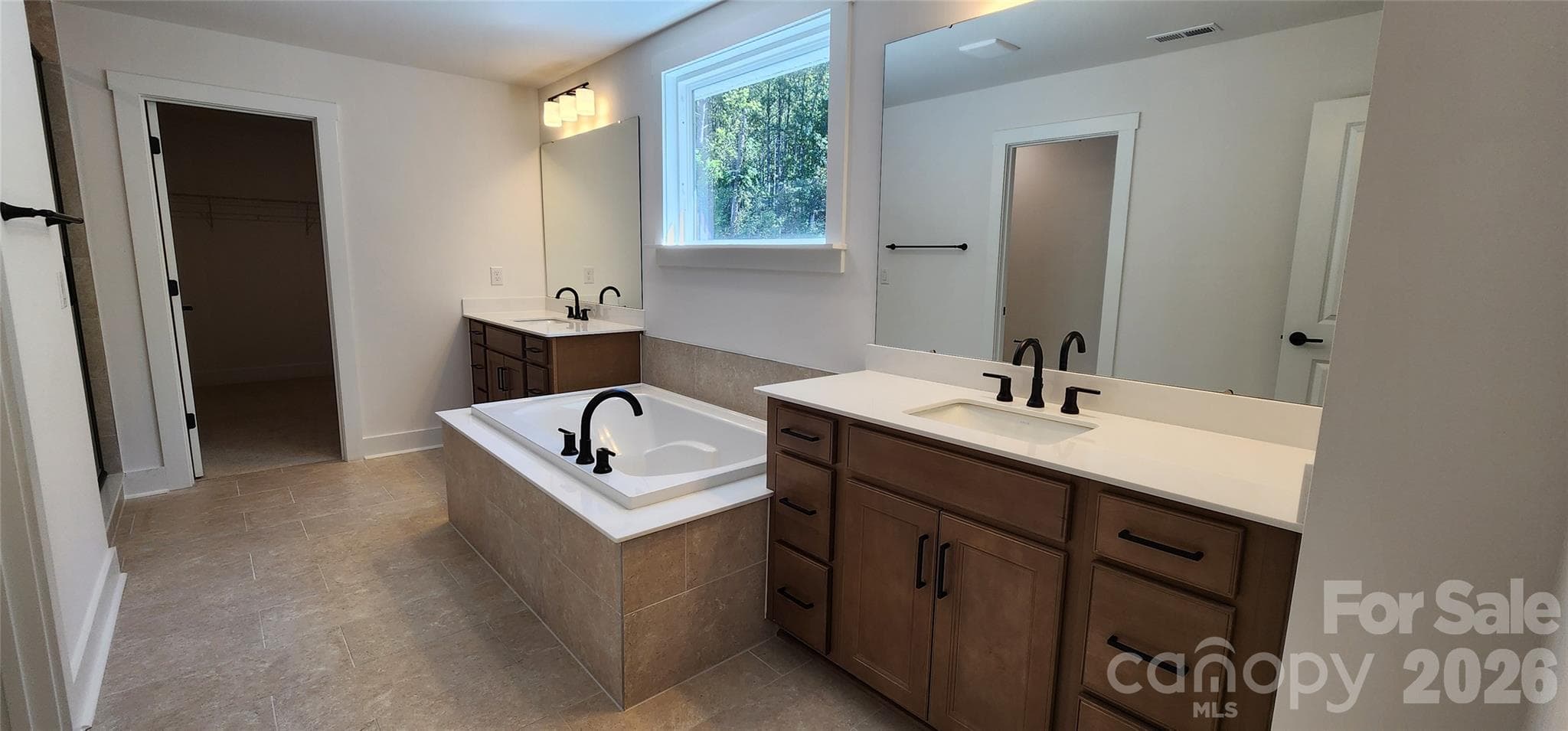 Primary bathroom with large soaking tub - 577 Cottage Garden Lane, Belmont