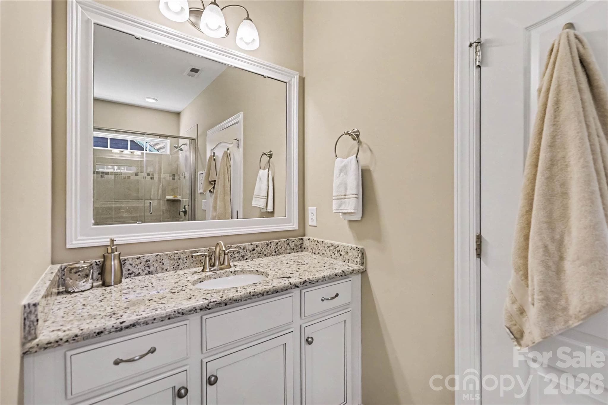 Primary bathroom has separate vanities - 1567 Tranquility Boulevard, Lancaster