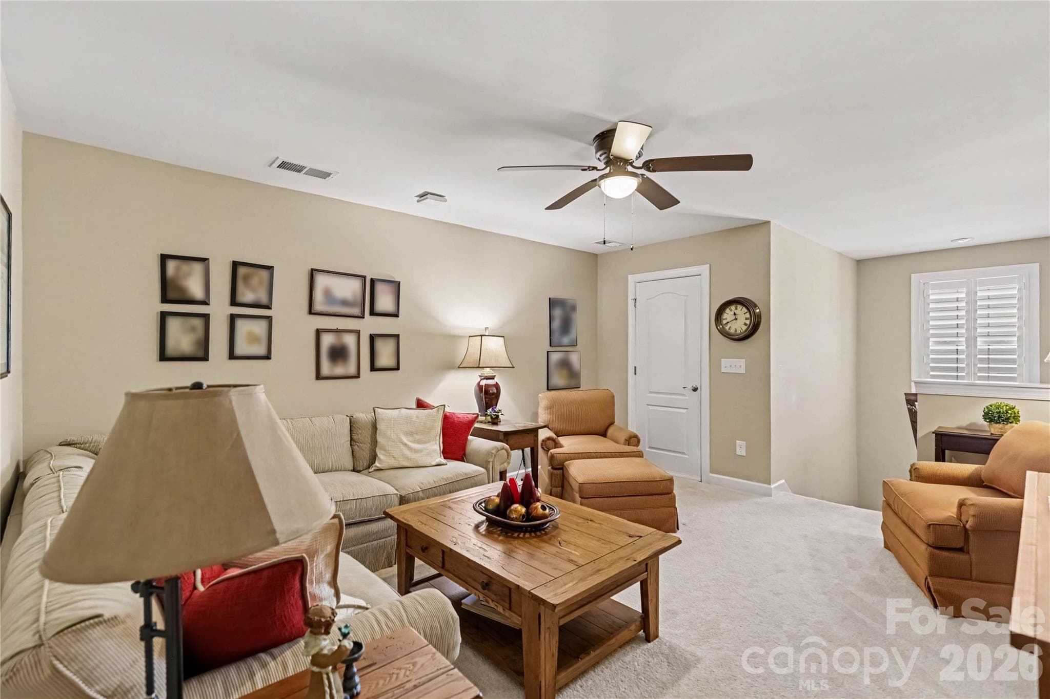 Upstairs bonus areahas a storage closet with custom shelves  and 2 additional attic storage areas - 1567 Tranquility Boulevard, Lancaster