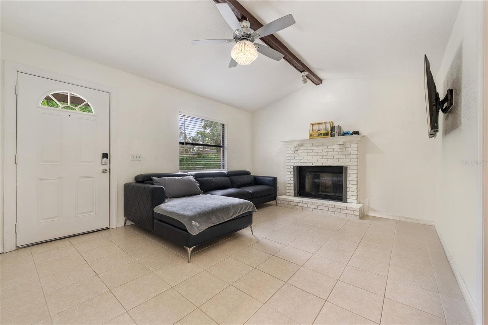 Front door opening into living room. - 2040 E TRIANGLE DR, LONGWOOD