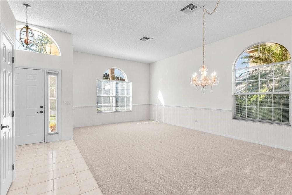 dining room and living room area - 477 LAKEPARK TRL, OVIEDO