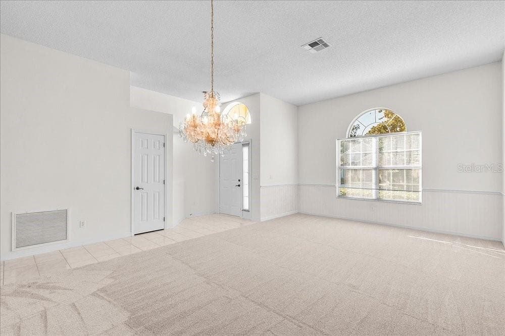 dining room and living room - 477 LAKEPARK TRL, OVIEDO