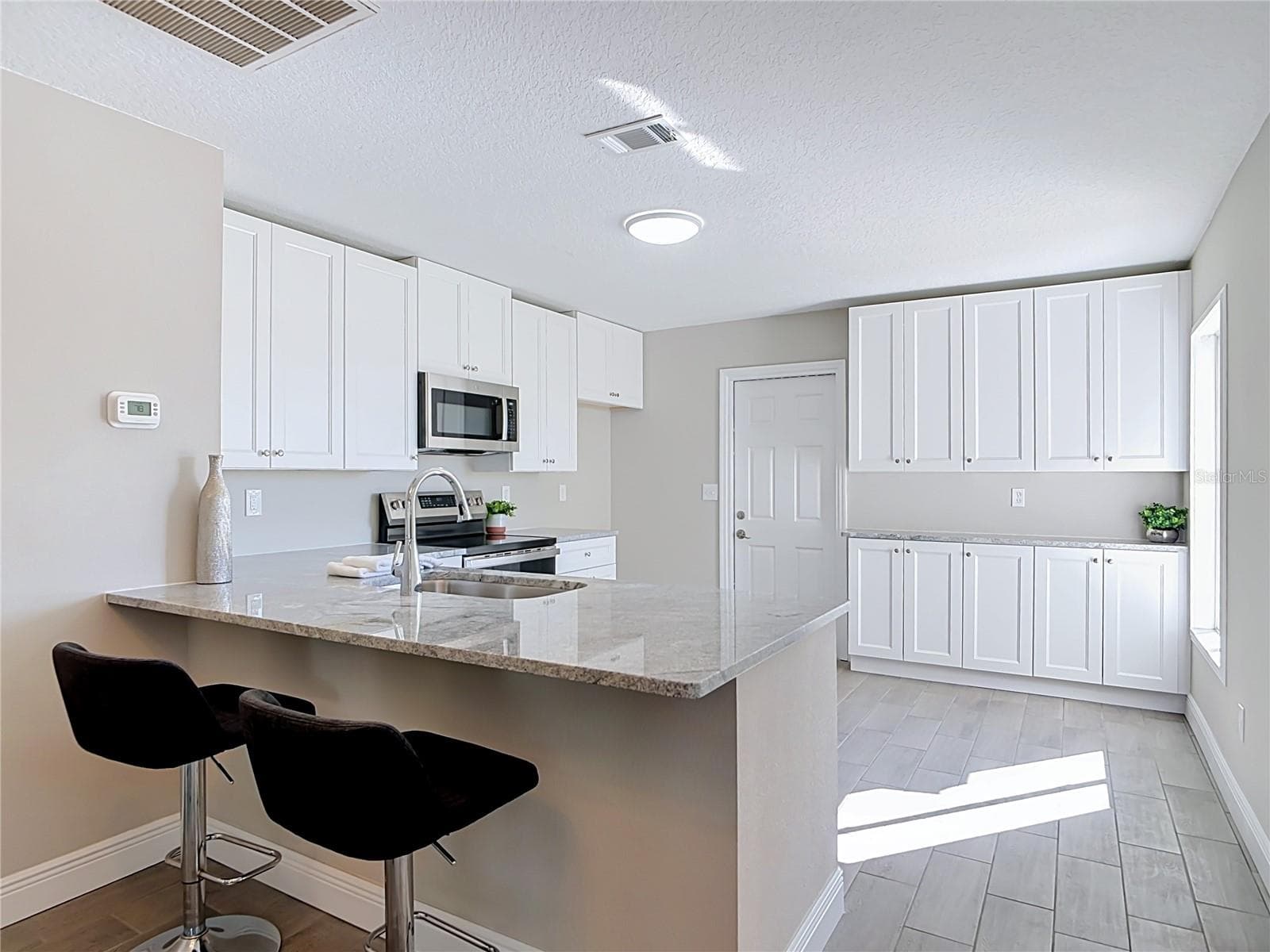 Single Family Residence at 3025 FOXBORO CIR, DELTONA, photo 8 of 68
