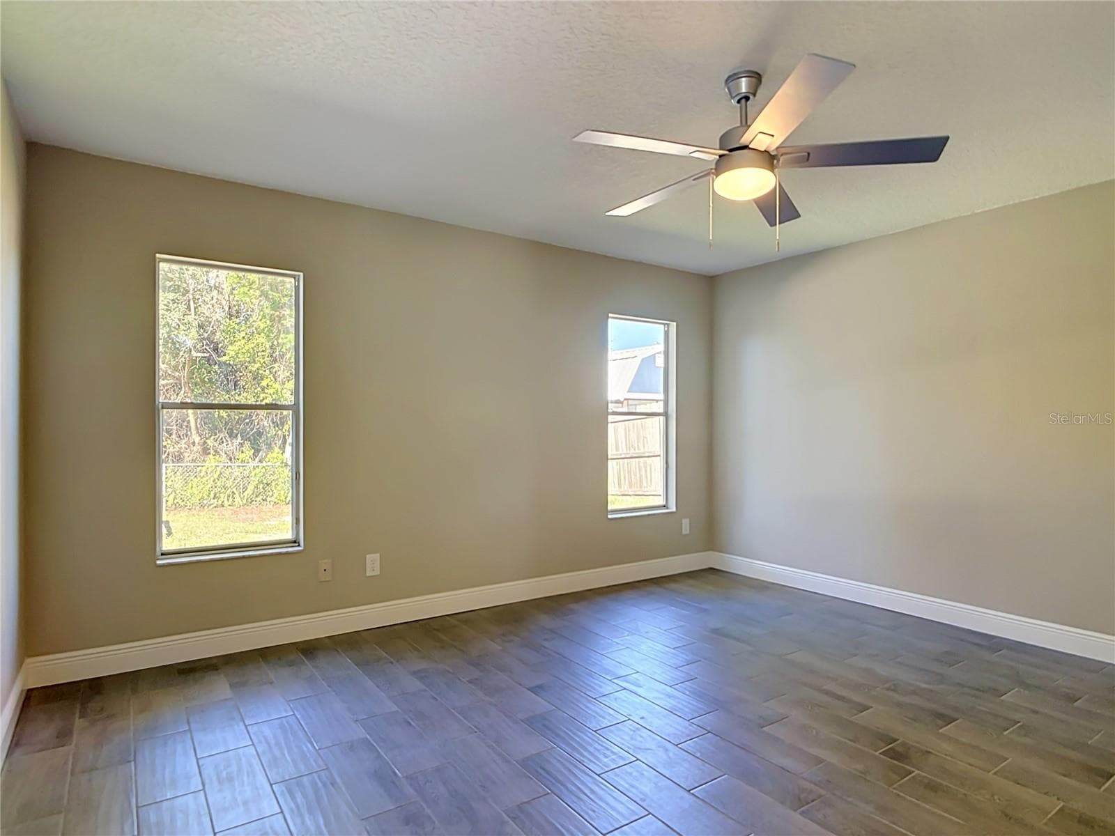 Primary Bedroom. - 3025 FOXBORO CIR, DELTONA