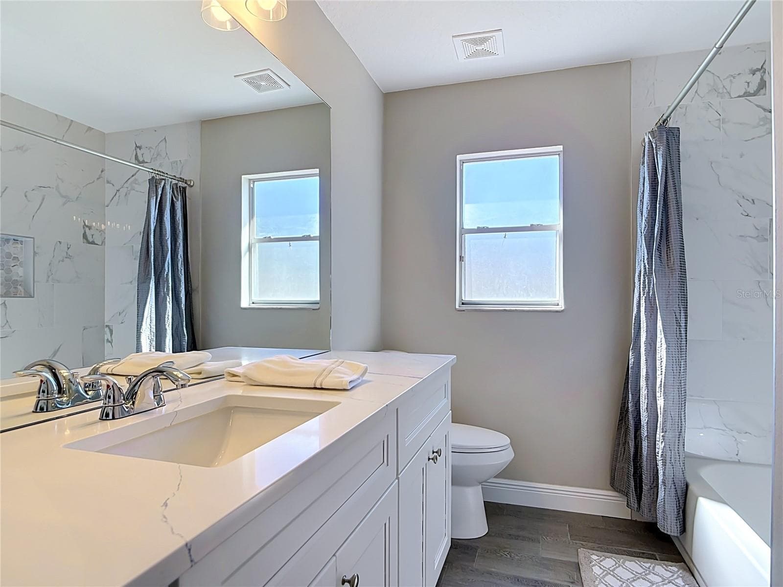 Guest bathroom. - 3025 FOXBORO CIR, DELTONA