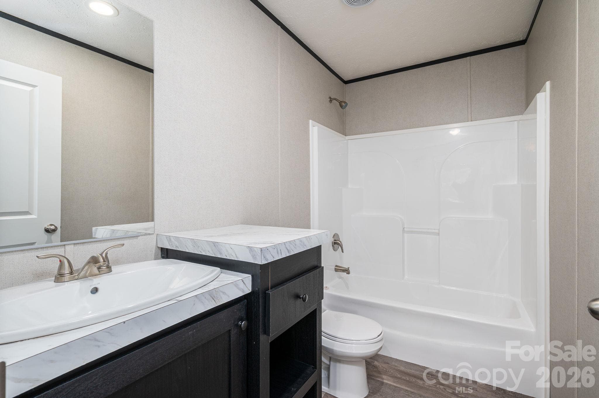 Guest Bath with Tub/shower and extra counter space - 207 Grassy Field Court, Lawndale