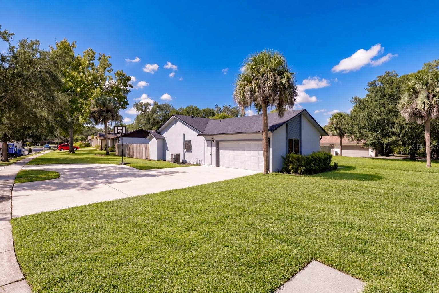 Circle driveway with side entry garage - 954 NIBLICK DR, CASSELBERRY