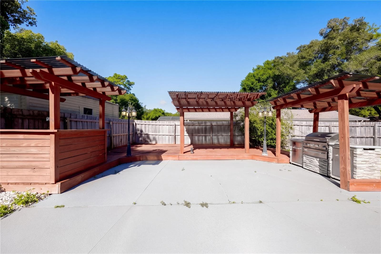 Outdoor pergola and grilling area - 954 NIBLICK DR, CASSELBERRY