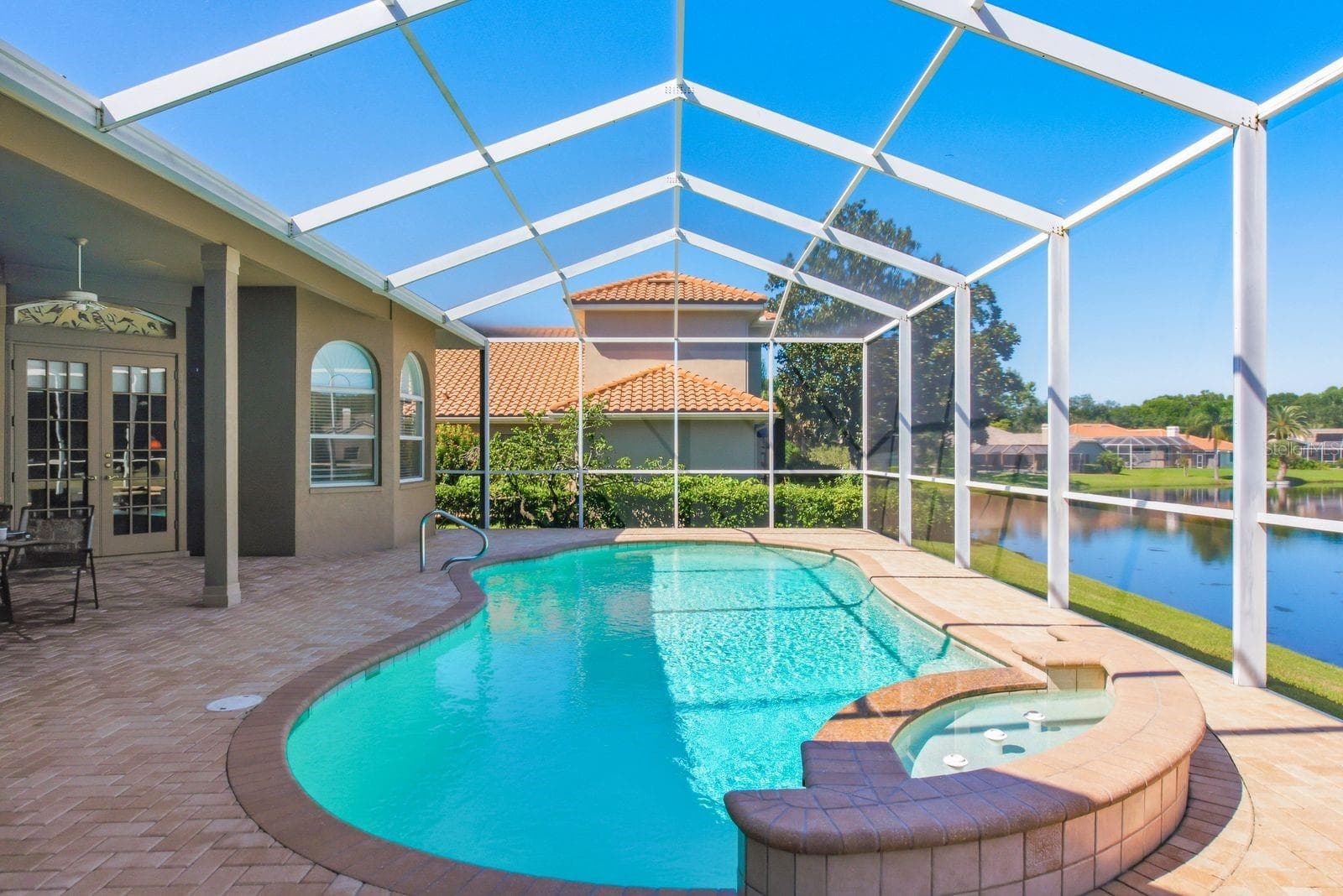 Pool with fountain on a timer - 3763 EXECUTIVE DR, PALM HARBOR